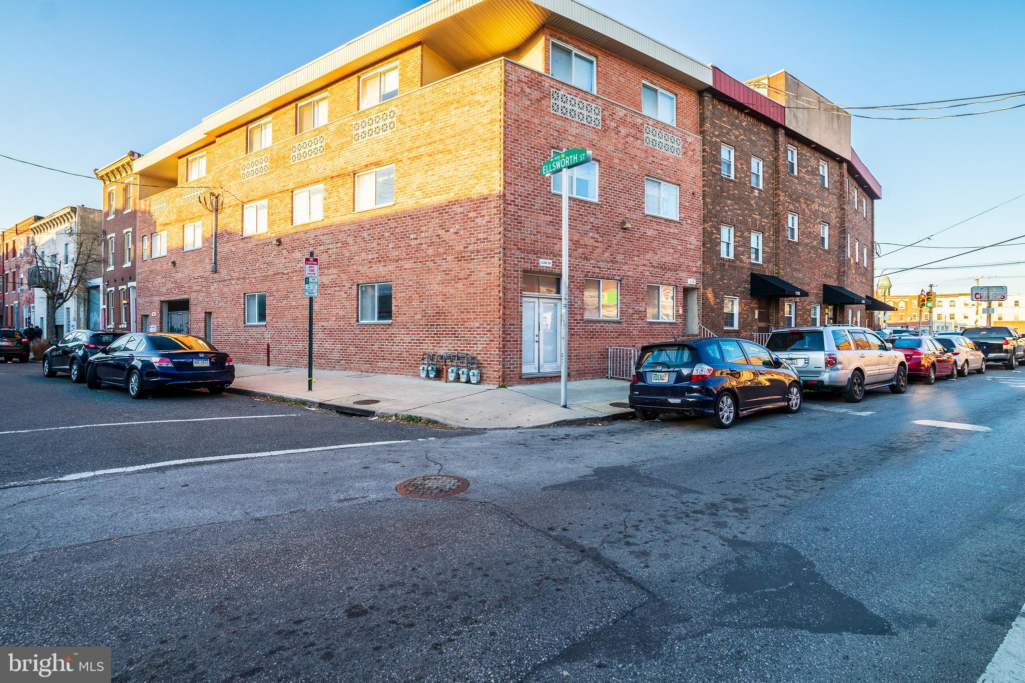 1126 East Passyunk Avenue, Unit 3 Philadelphia, PA 19147 - Photo 9 of 9 a view of a cars parked in front of a building