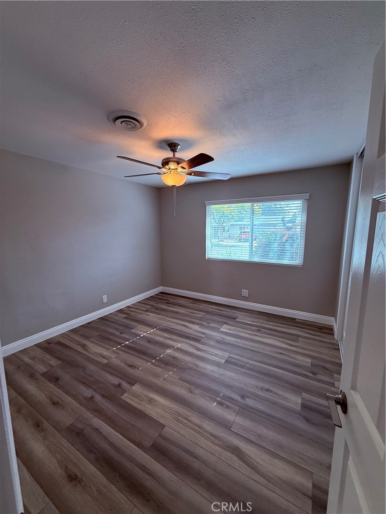 596 Opal Avenue Hemet, CA 92543 - Photo 14 of 30 a view of an empty room with a window