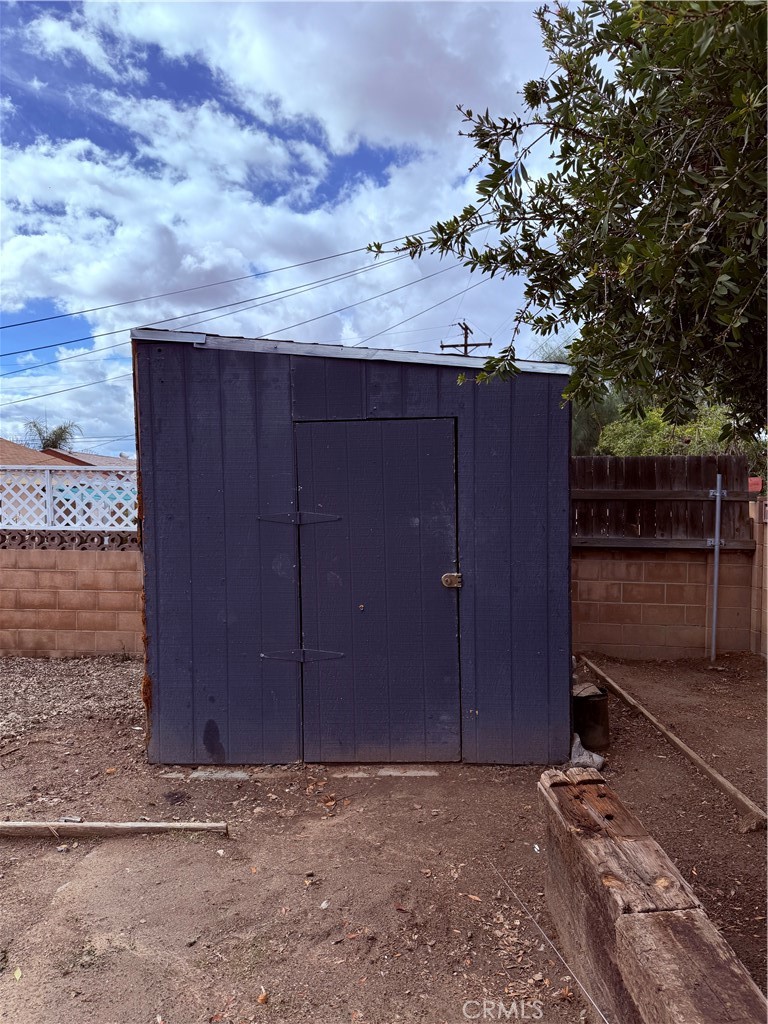 596 Opal Avenue Hemet, CA 92543 - Photo 29 of 30 a view of backyard with wooden fence