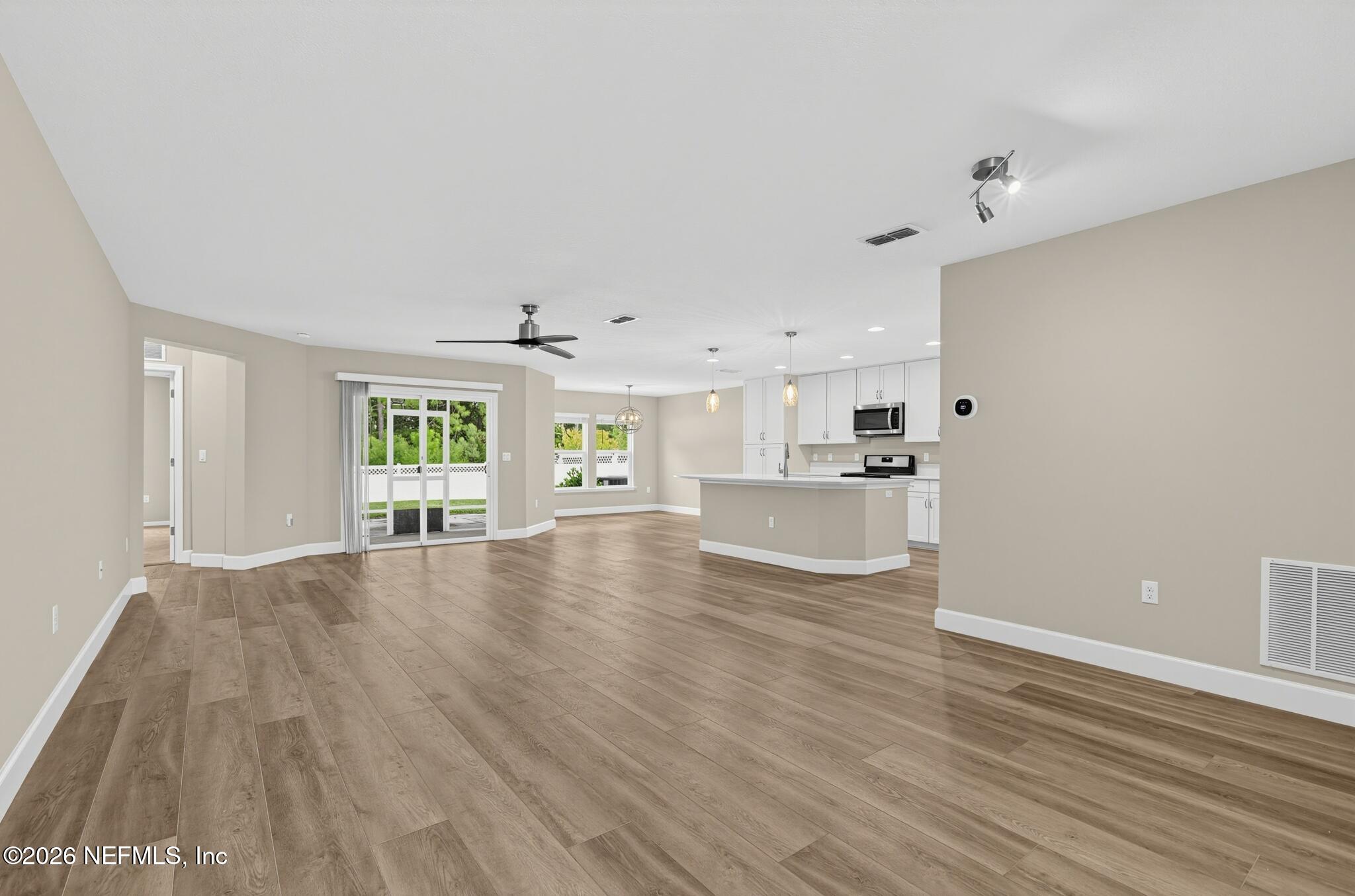 331 Meadow Ridge Drive St. Augustine, FL 32092 - Photo 7 of 36 09_331_Meadow_Ridge_Dr-Living_room-7784