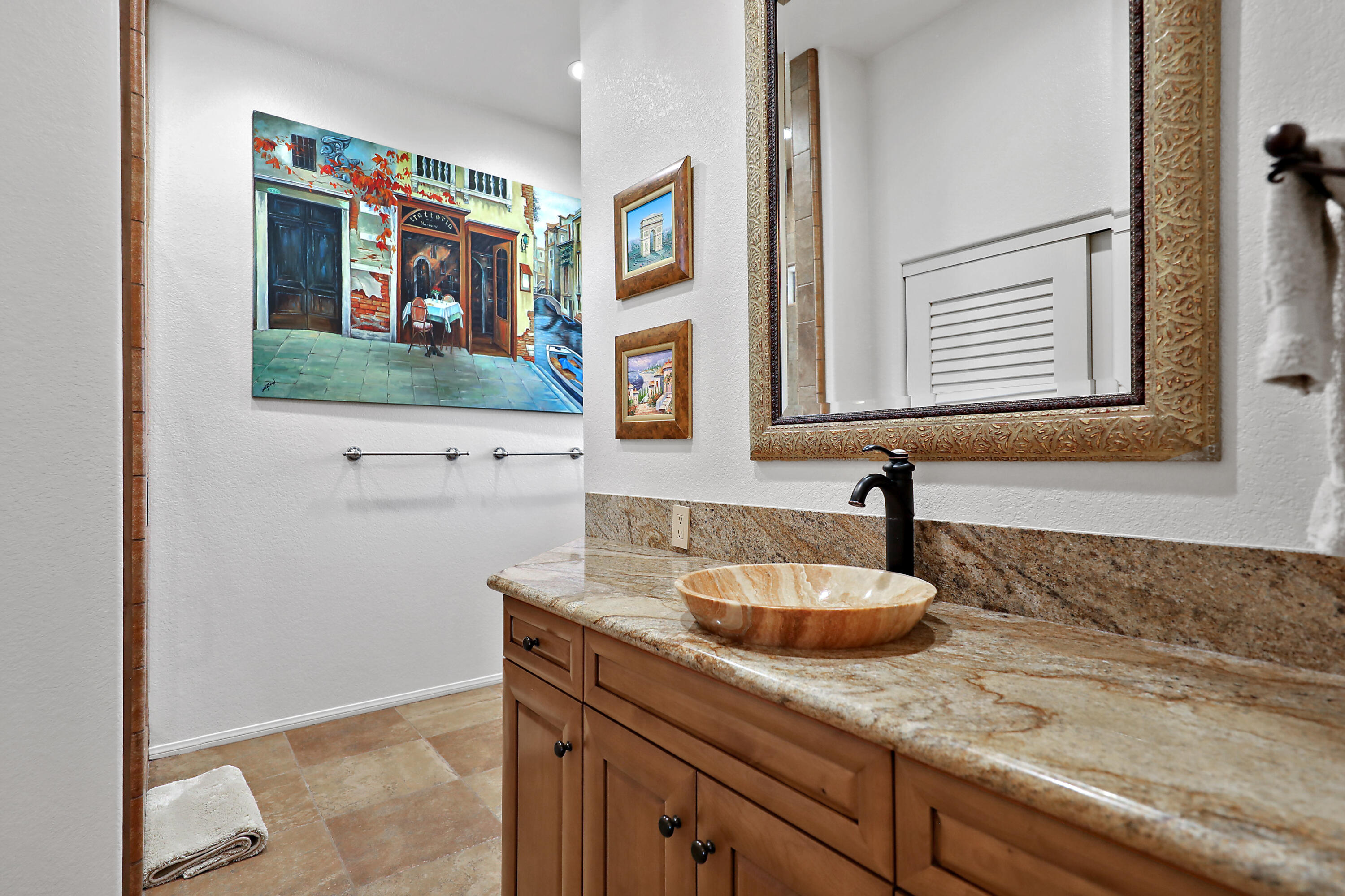 43651 Port Maria Road Bermuda Dunes, CA 92203 - Photo 21 of 46 a bathroom with a sink and a mirror