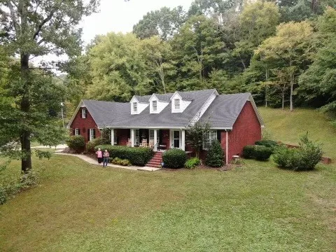 a front view of a house with a porch