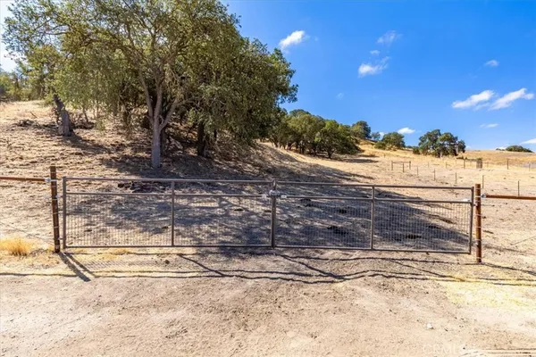 an aerial view of ocean with beach