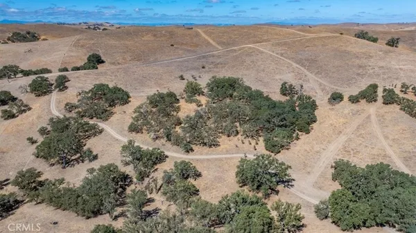 an aerial view of mountain with beach