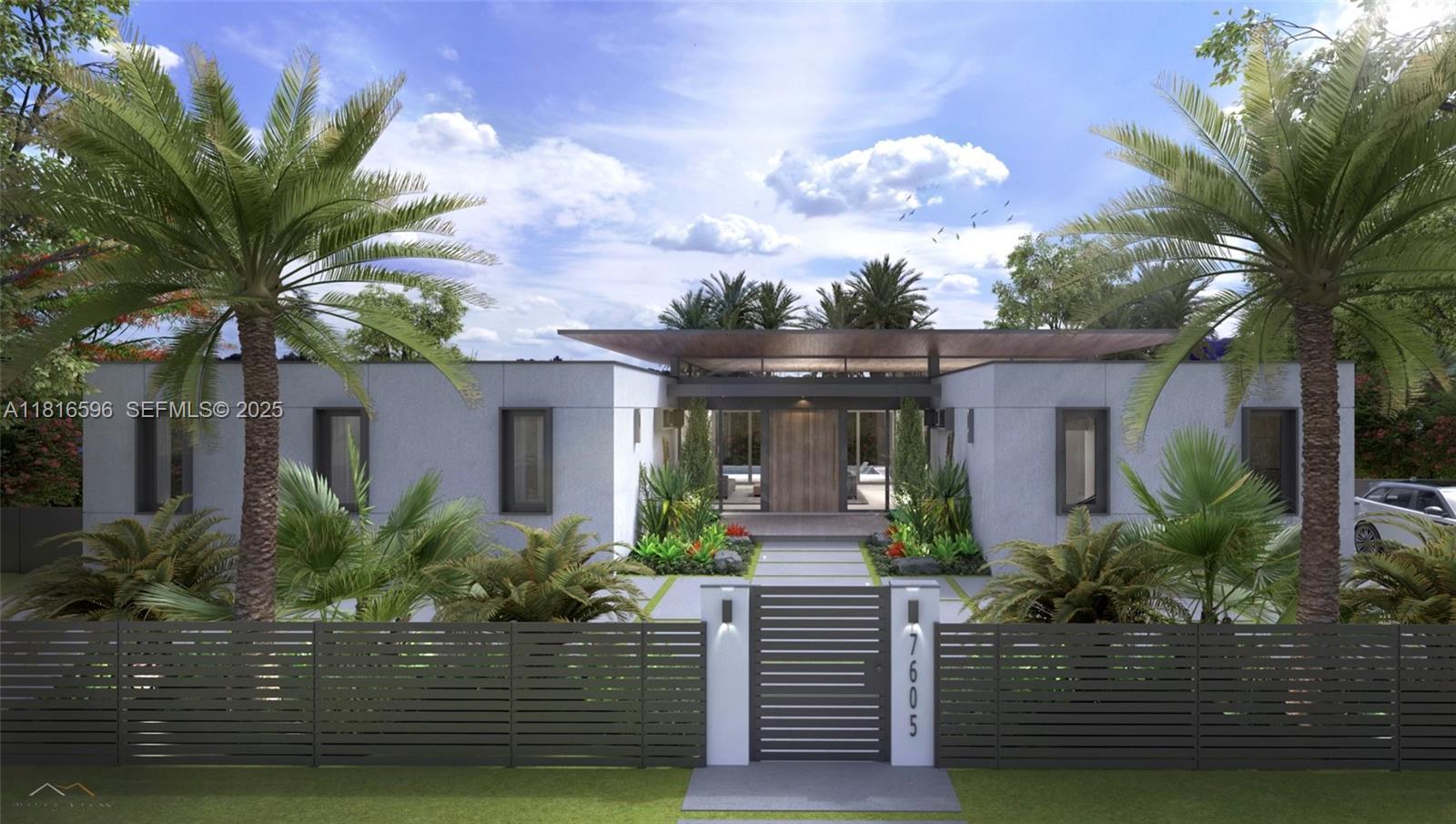 7605 Southwest 134th Street Pinecrest, FL 33156 - Photo 1 of 12 a front view of house with yard and outdoor seating