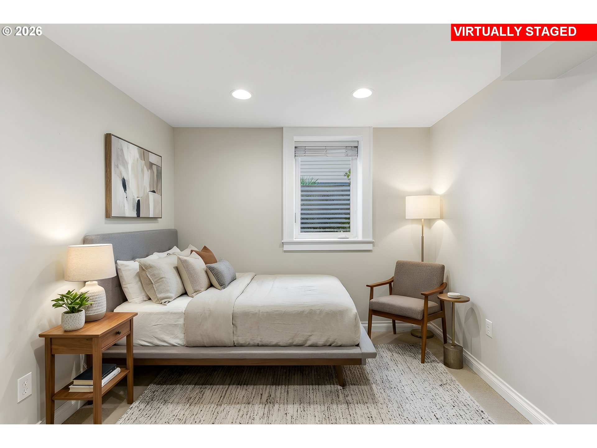 1825 Northeast 53rd Avenue Portland, OR 97213 - Photo 27 of 41 a bedroom with a bed and a lamp