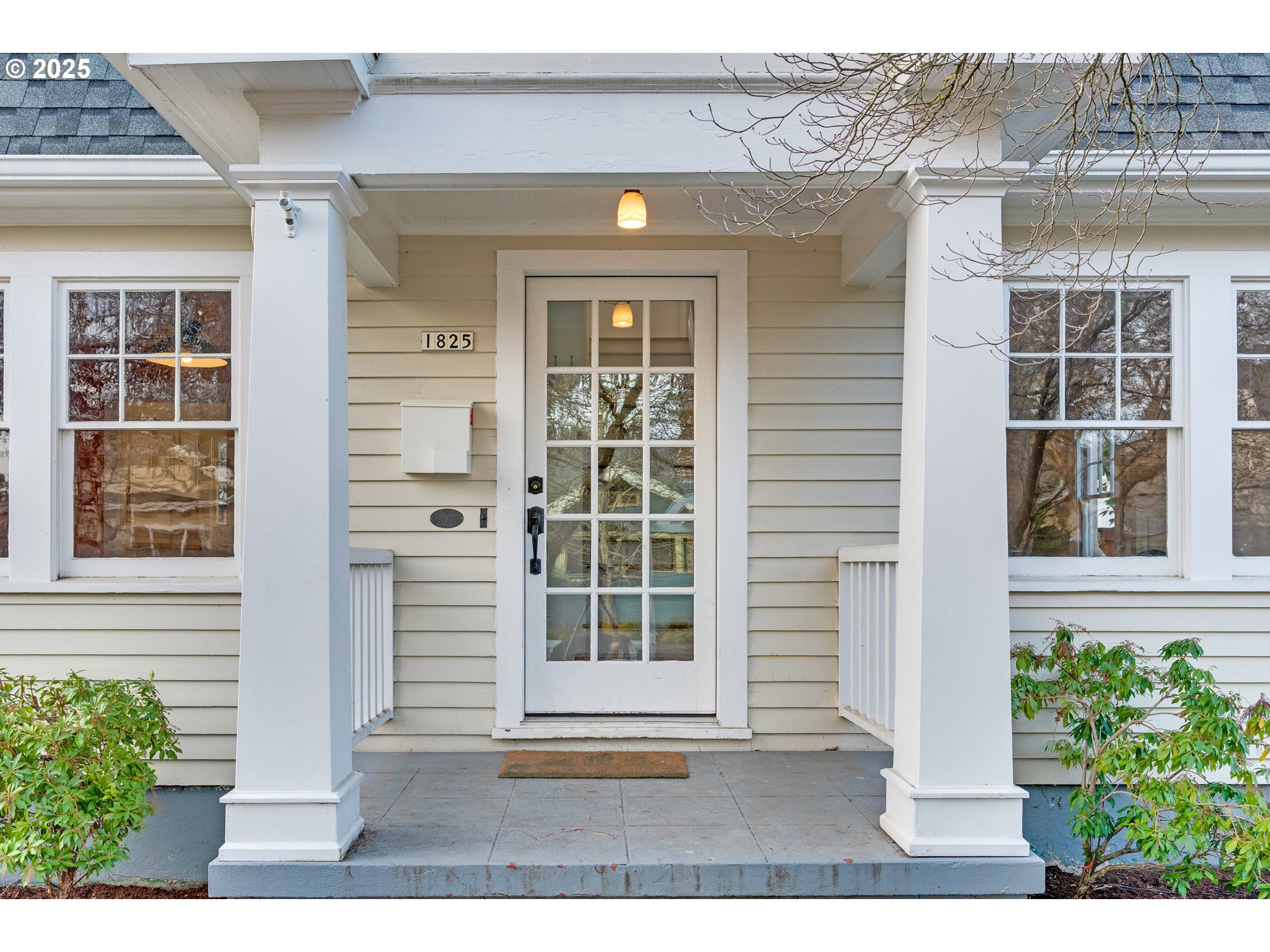 1825 Northeast 53rd Avenue Portland, OR 97213 - Photo 3 of 41 a front view of a house with a yard