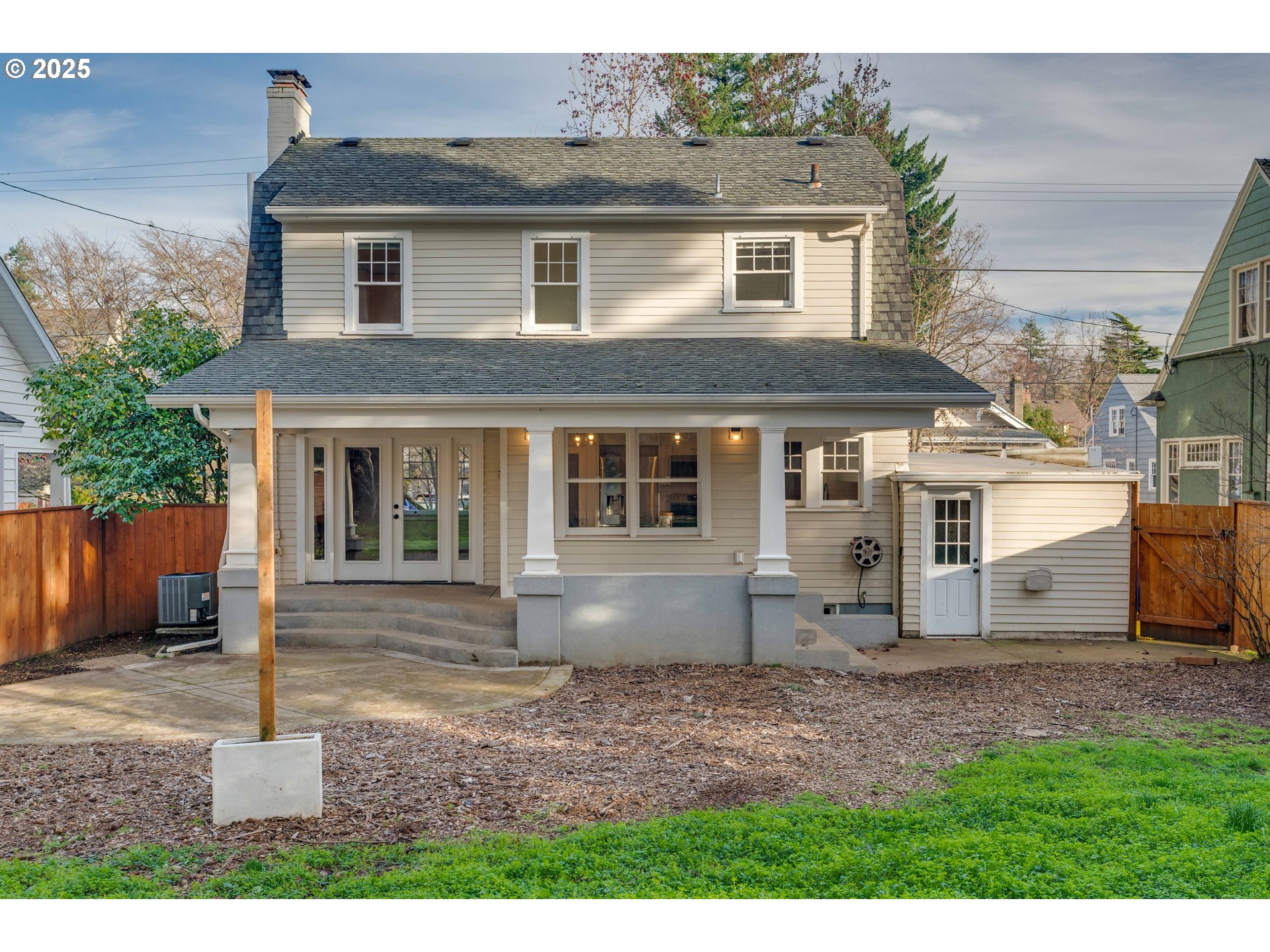 1825 Northeast 53rd Avenue Portland, OR 97213 - Photo 38 of 41 a front view of a house with a yard