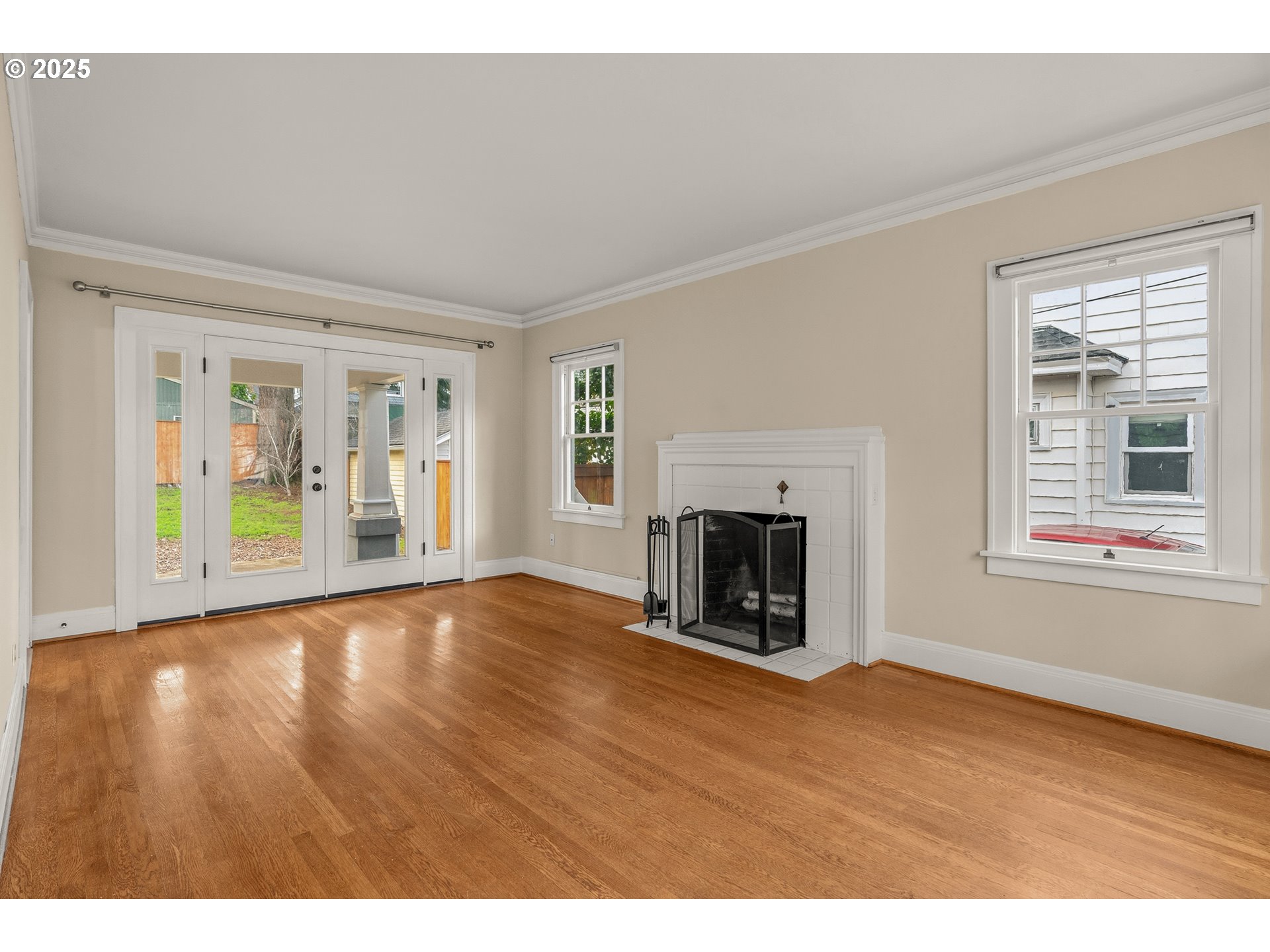 1825 Northeast 53rd Avenue Portland, OR 97213 - Photo 5 of 41 a view of an empty room with window and fire place