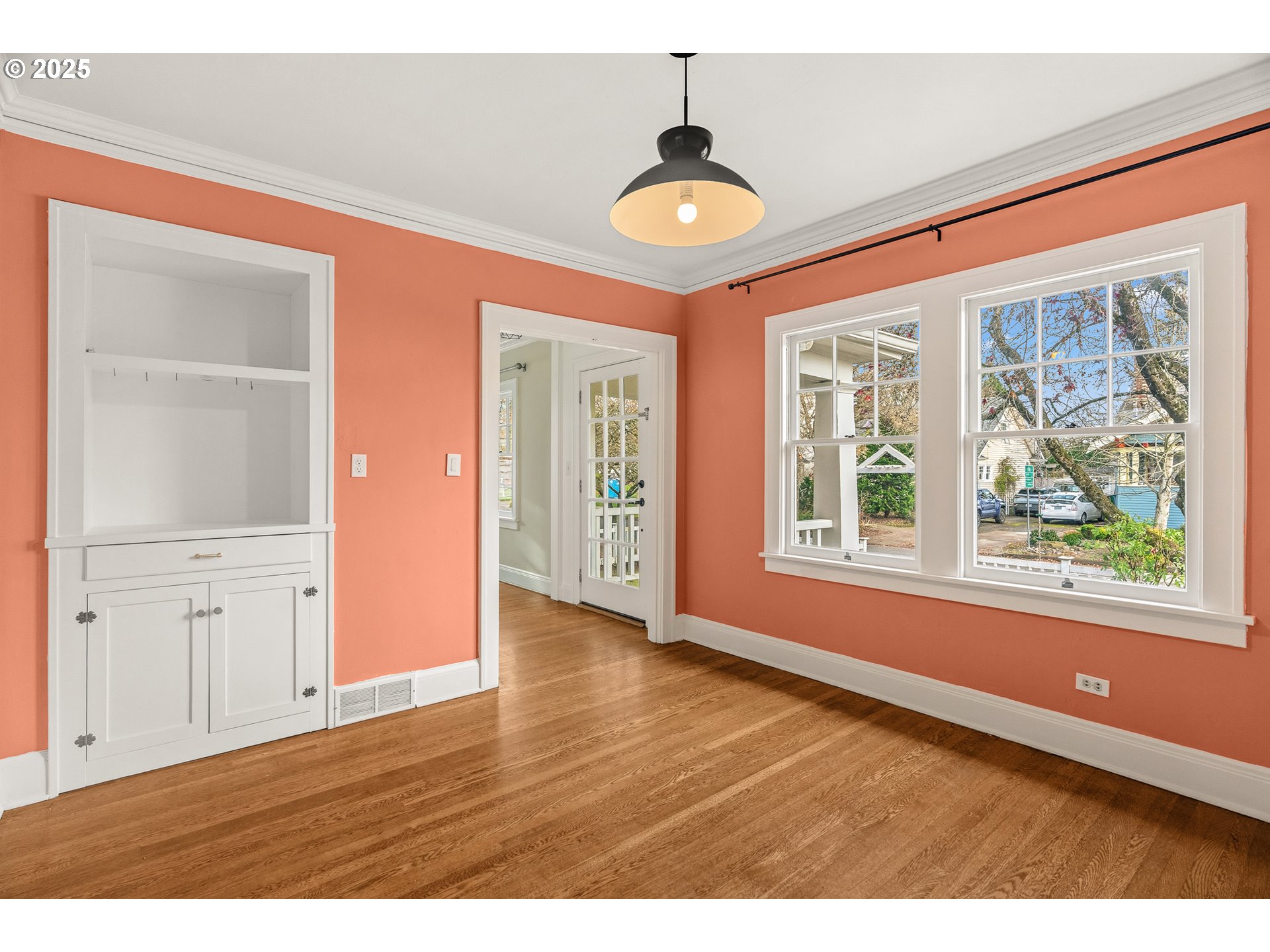 1825 Northeast 53rd Avenue Portland, OR 97213 - Photo 10 of 41 a view of an empty room with wooden floor and a window