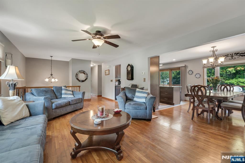 55 Marcia Road Ringwood, NJ 07456 - Photo 11 of 42 a living room with furniture and a large window