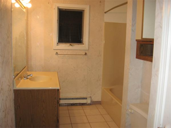 121 Copperfield Road Worcester, MA 01602 - Photo 6 of 18 a bathroom with a sink and a mirror