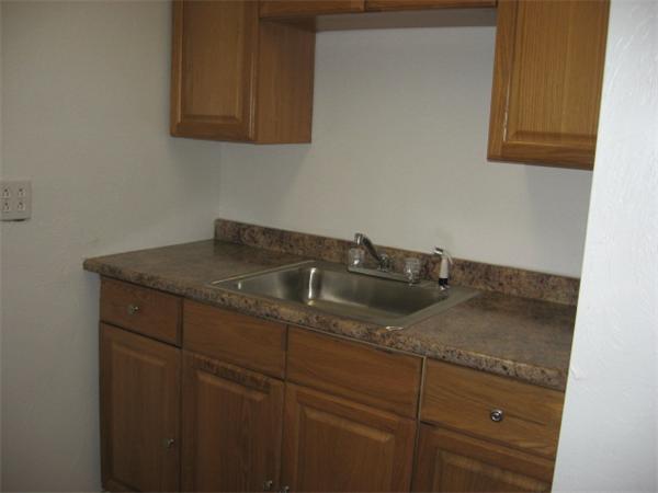121 Copperfield Road Worcester, MA 01602 - Photo 8 of 18 a view of a sink and cabinets