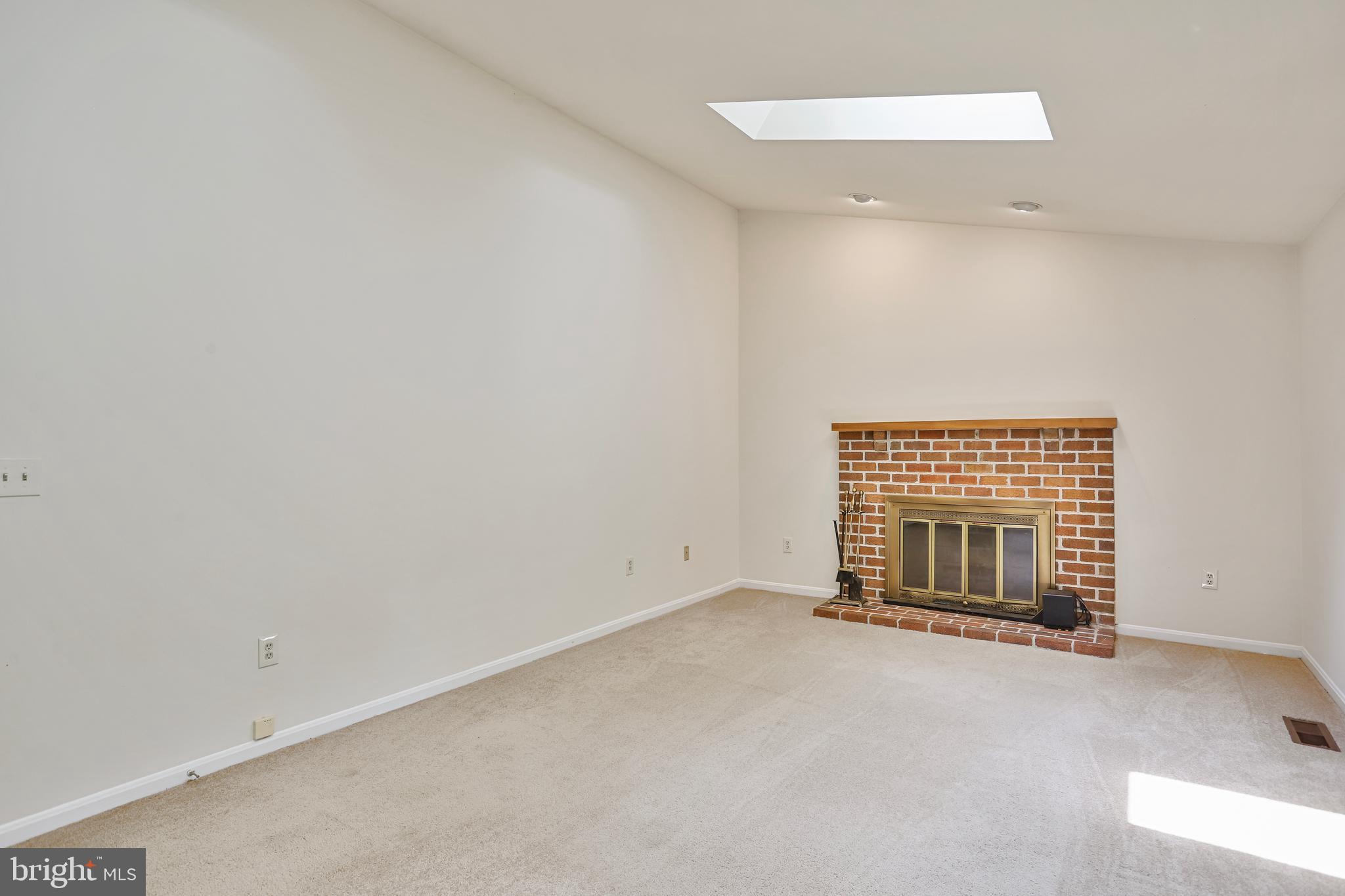 15108 Plum Tree Way Bowie, MD 20721 - Photo 19 of 51 an empty room with fireplace
