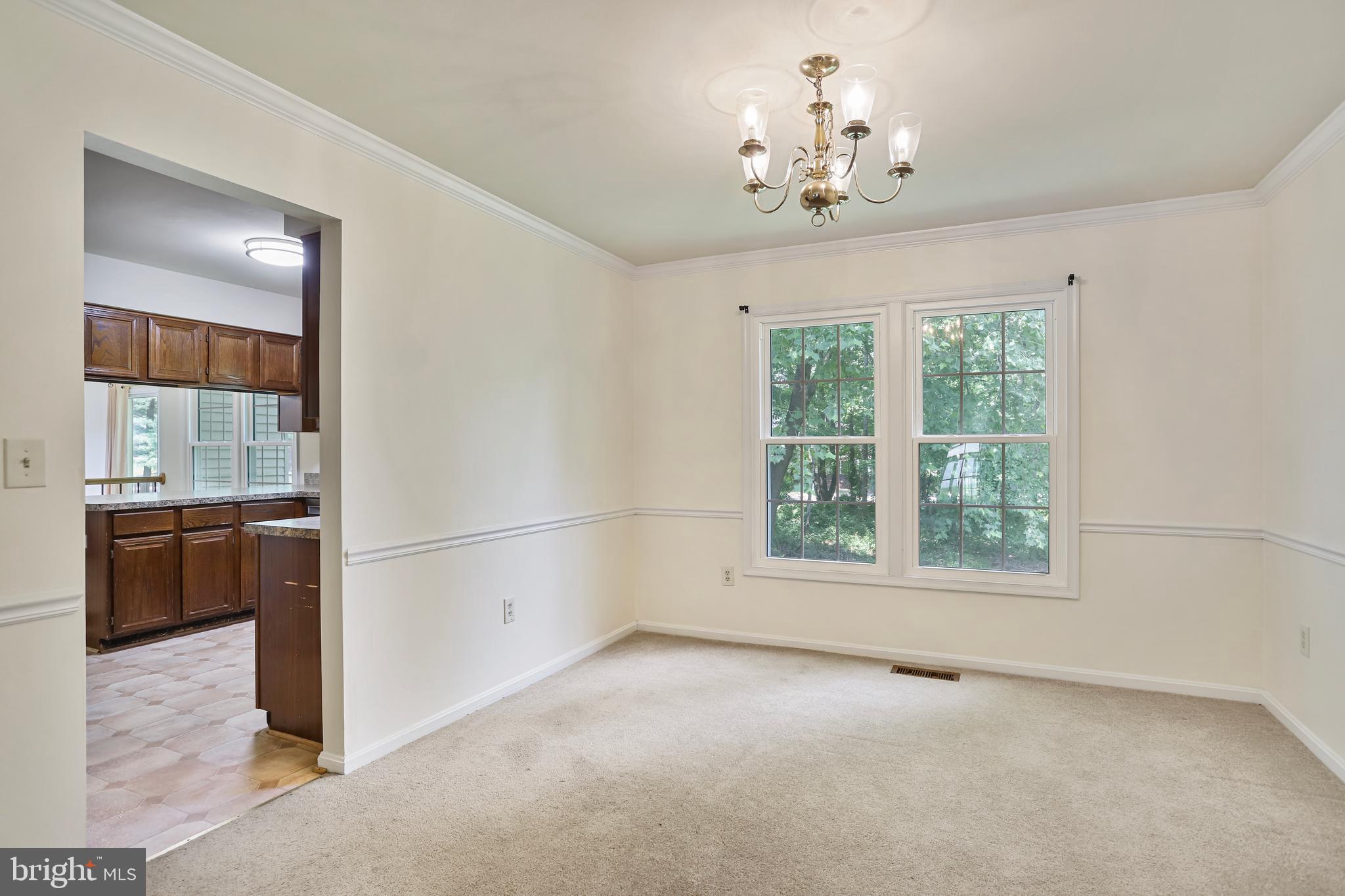 15108 Plum Tree Way Bowie, MD 20721 - Photo 22 of 51 a view of an empty room with a window