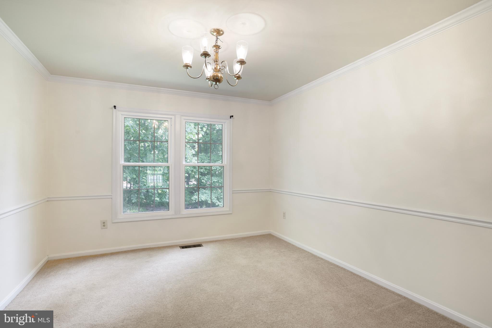 15108 Plum Tree Way Bowie, MD 20721 - Photo 23 of 51 wooden floor in an empty room with a window