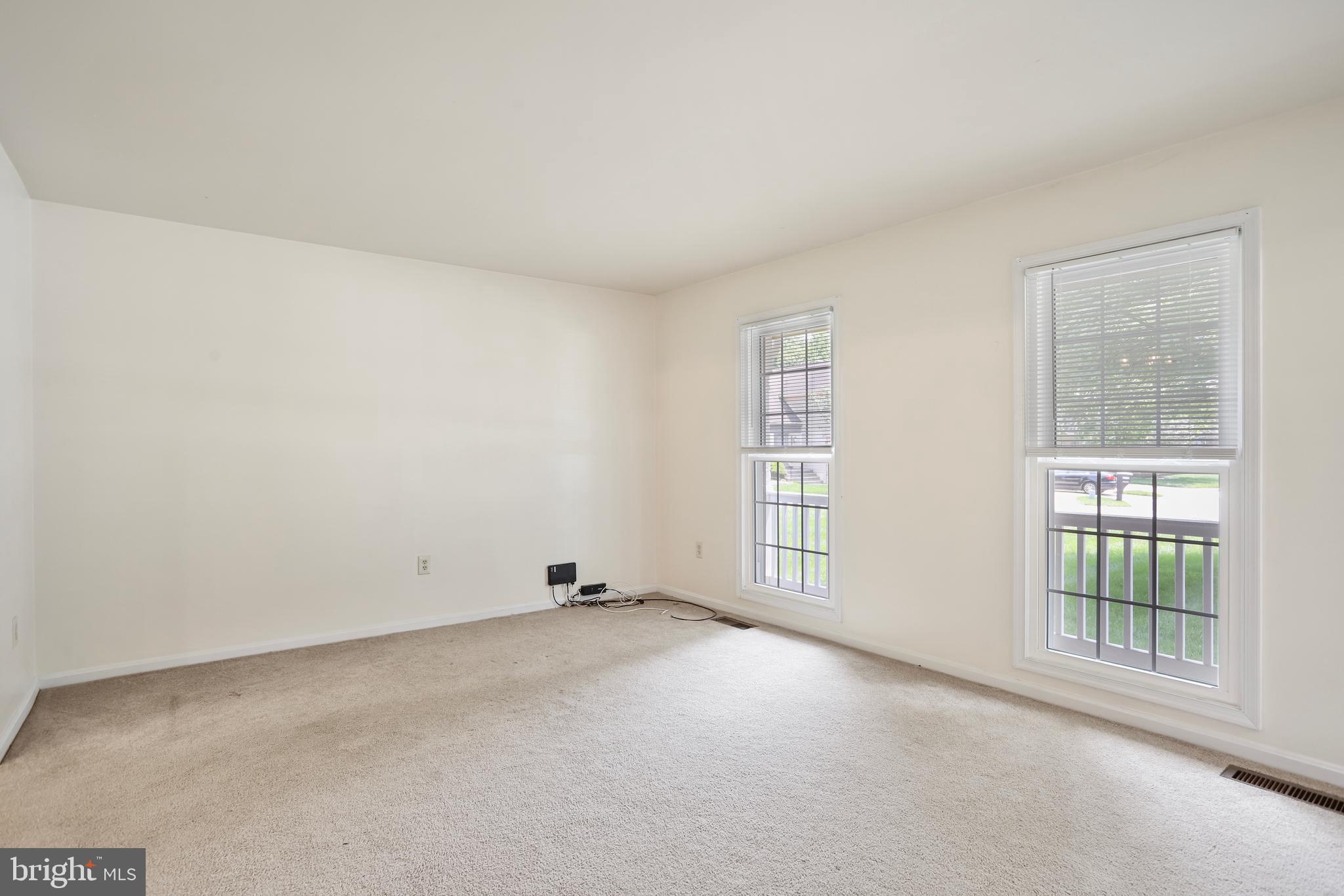 15108 Plum Tree Way Bowie, MD 20721 - Photo 26 of 51 an empty room with windows