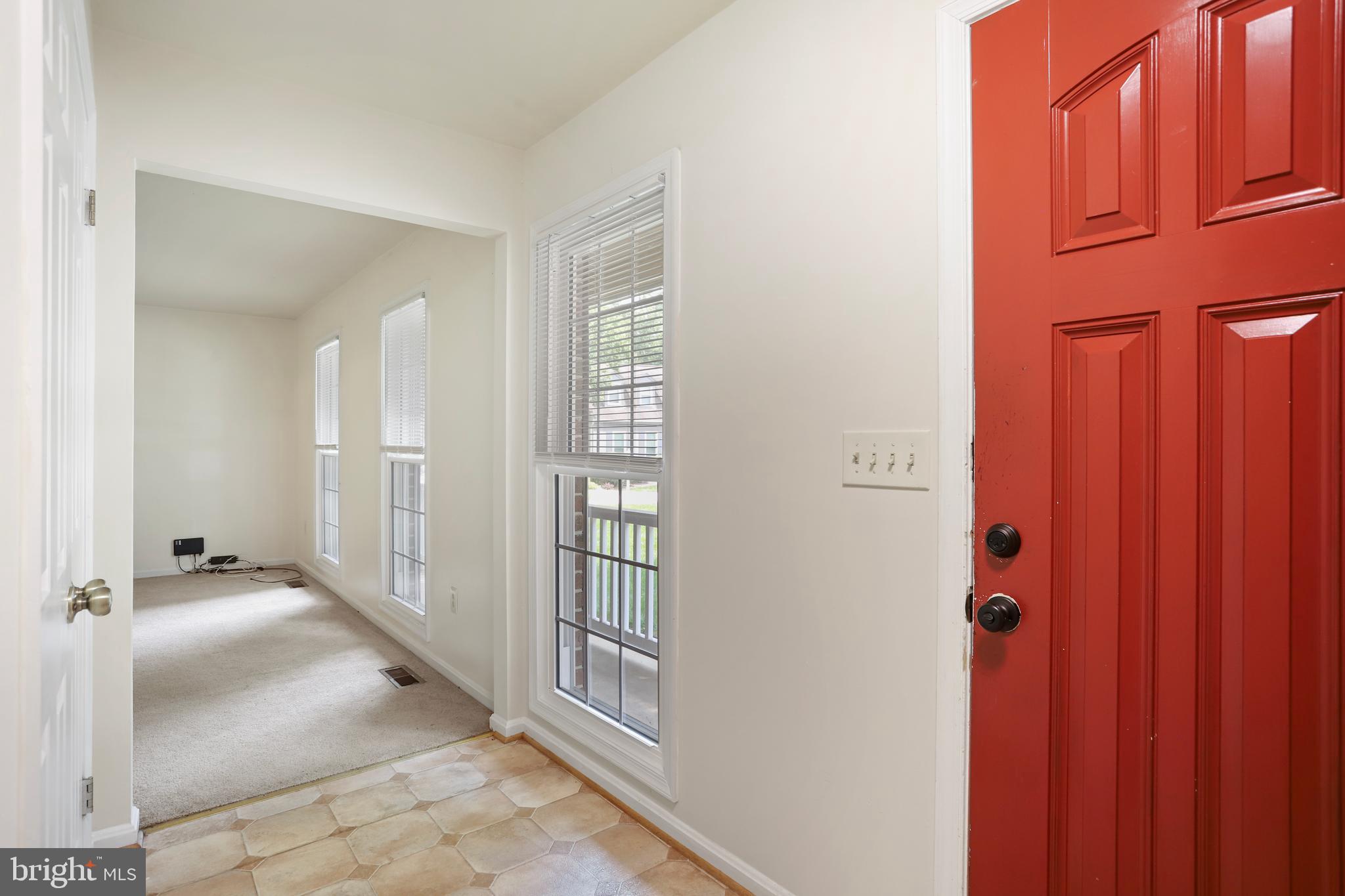 15108 Plum Tree Way Bowie, MD 20721 - Photo 31 of 51 a view of a hallway with windows