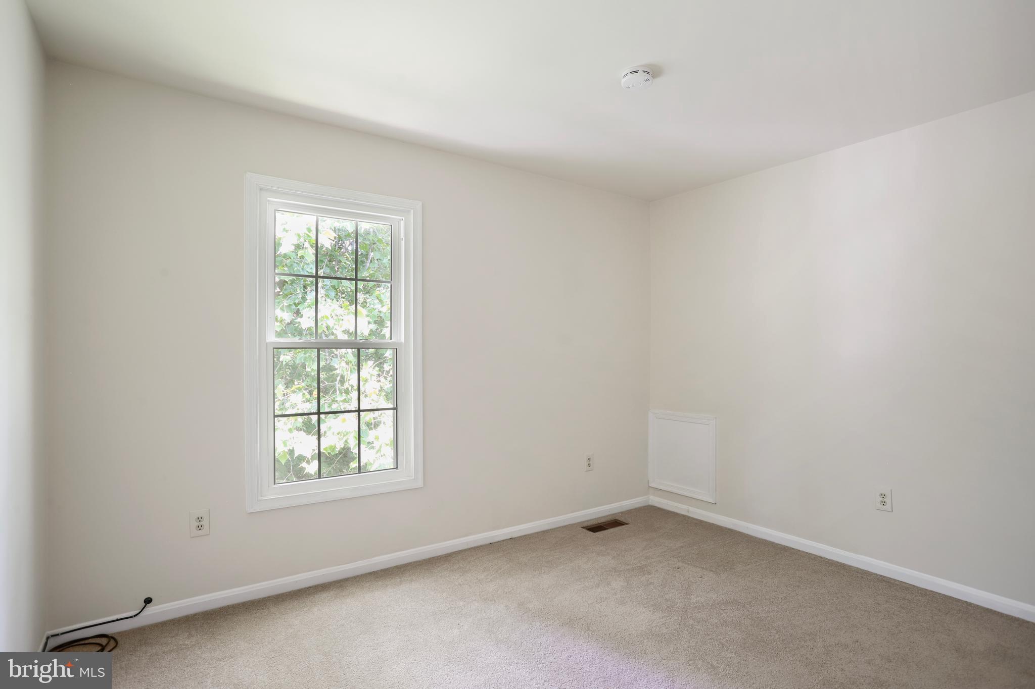 15108 Plum Tree Way Bowie, MD 20721 - Photo 39 of 51 an empty room with a window