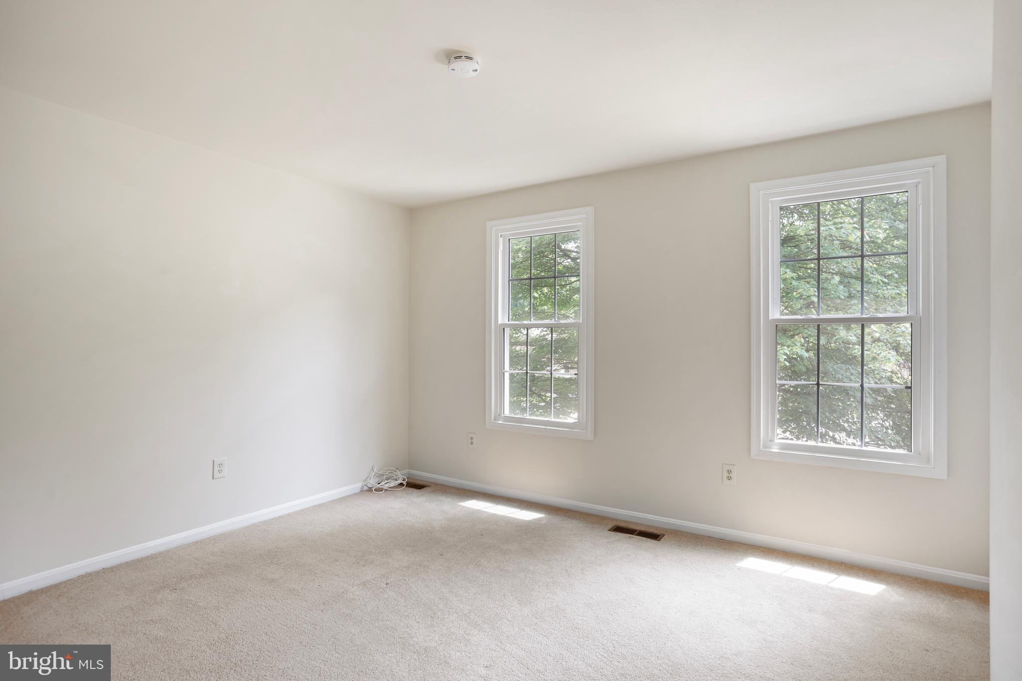 15108 Plum Tree Way Bowie, MD 20721 - Photo 40 of 51 an empty room with windows