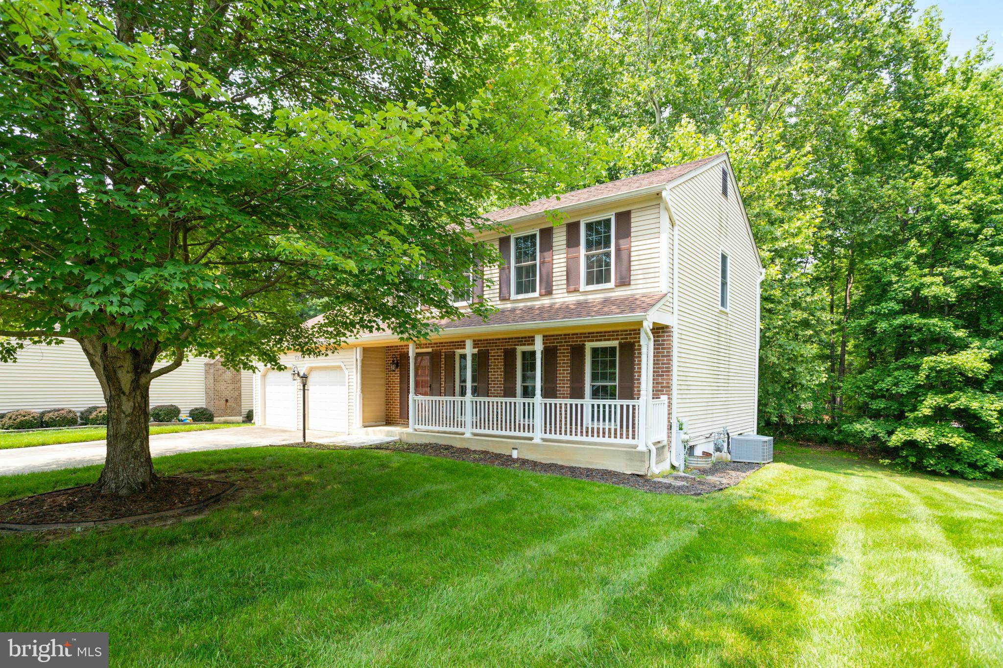 15108 Plum Tree Way Bowie, MD 20721 - Photo 4 of 51 a front view of a house with a yard