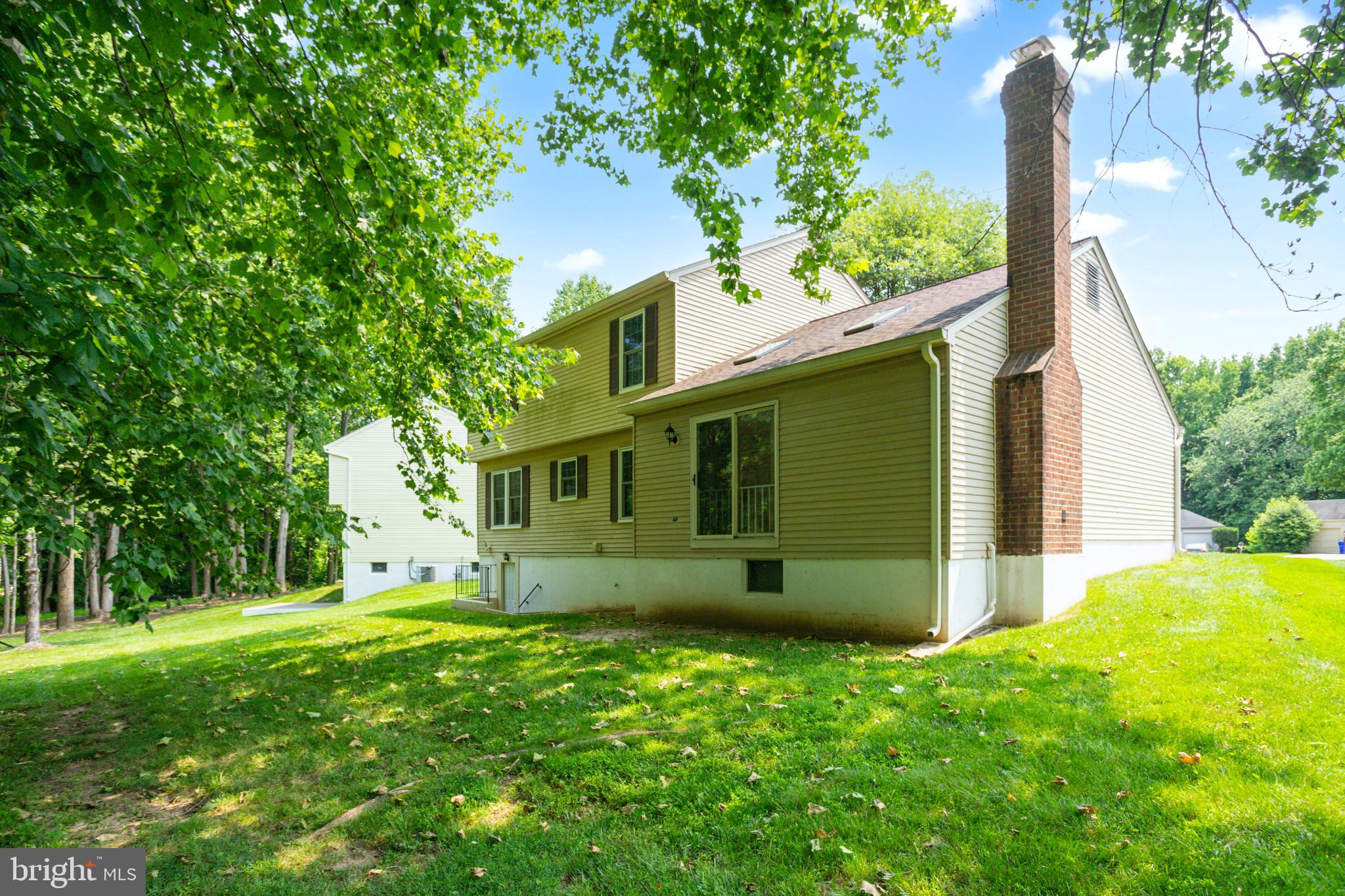 15108 Plum Tree Way Bowie, MD 20721 - Photo 7 of 51 a view of a house with backyard