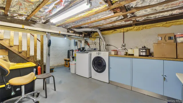 a view of a patio with chairs and a table