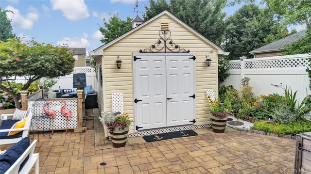a garden view with a seating space