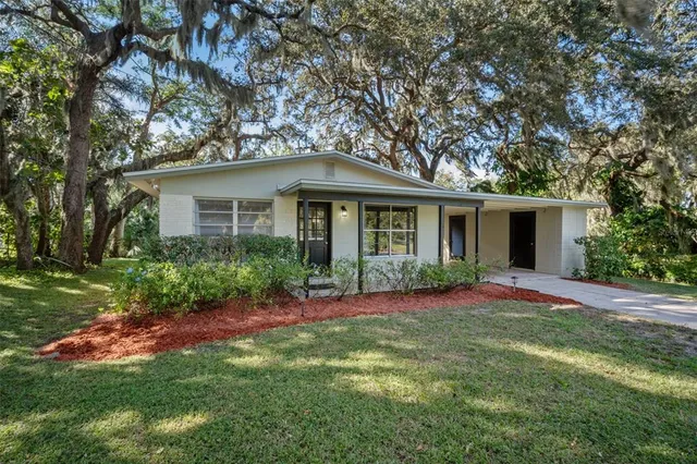 front view of a house with a yard