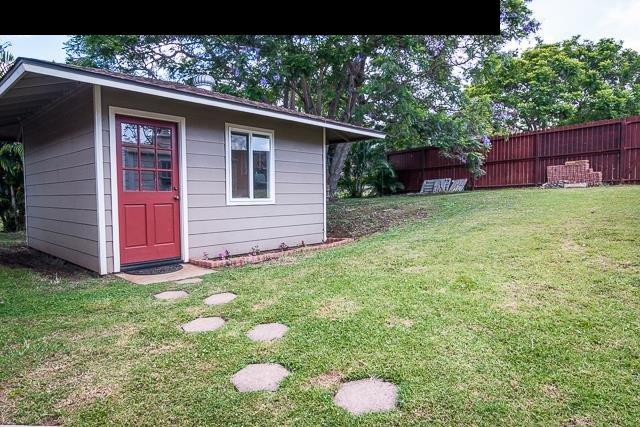 17 Holopuni Road Kula, HI 96790 - Photo 26 of 30 a backyard of a house with seating space