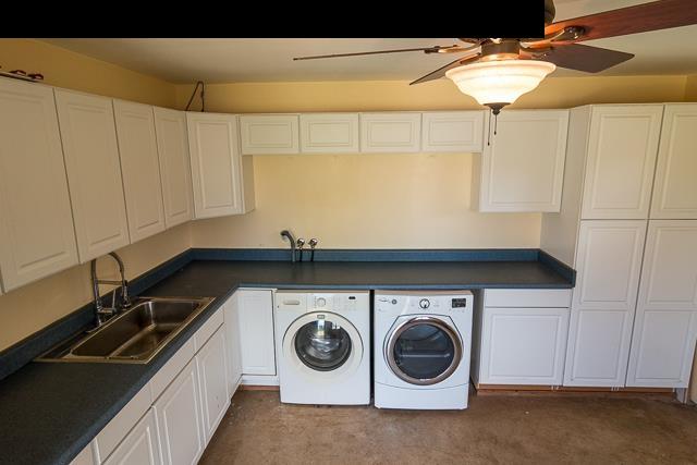 17 Holopuni Road Kula, HI 96790 - Photo 27 of 30 a utility room with dryer and washer