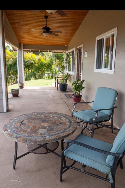 17 Holopuni Road Kula, HI 96790 - Photo 9 of 30 a living room with furniture and a potted plant
