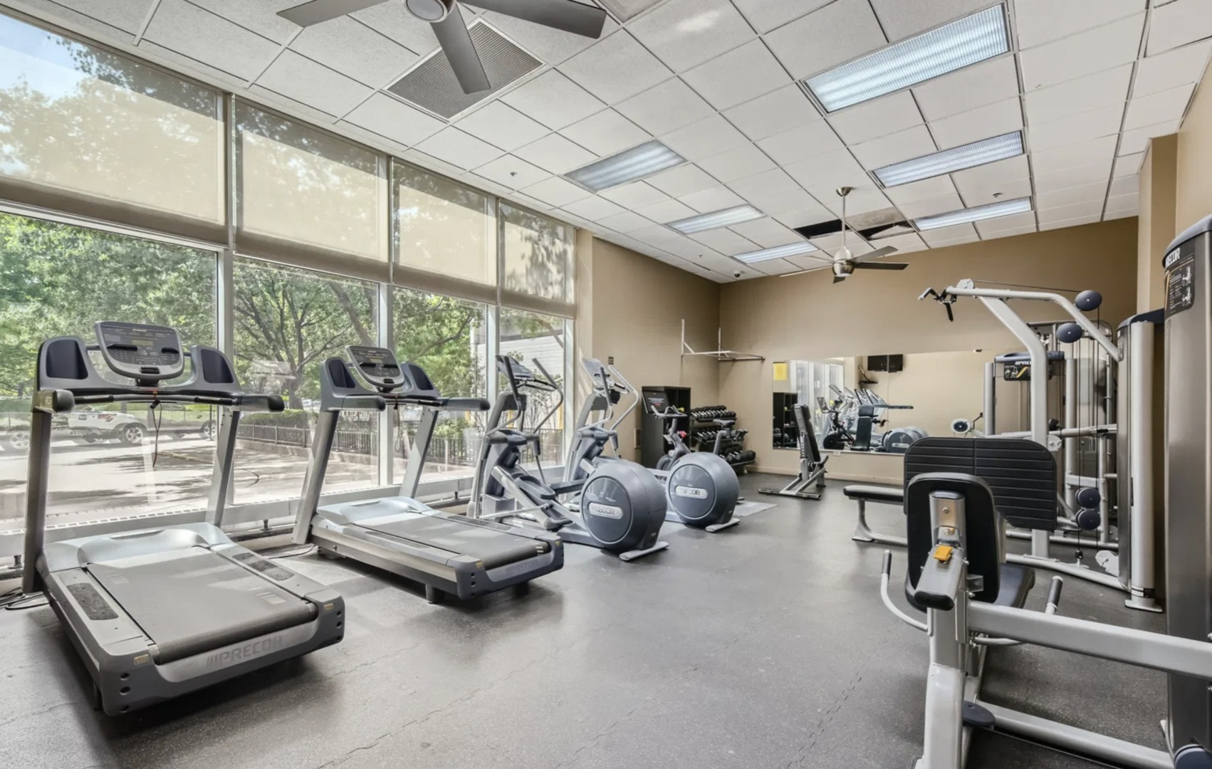 645 North Kingsbury Street, Unit 1002 Chicago, IL 60654 - Photo 2 of 11 a view of a room with gym equipment