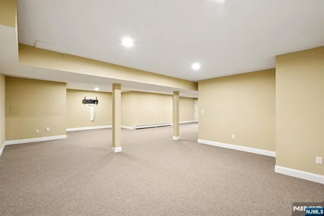 a view of a park with large trees