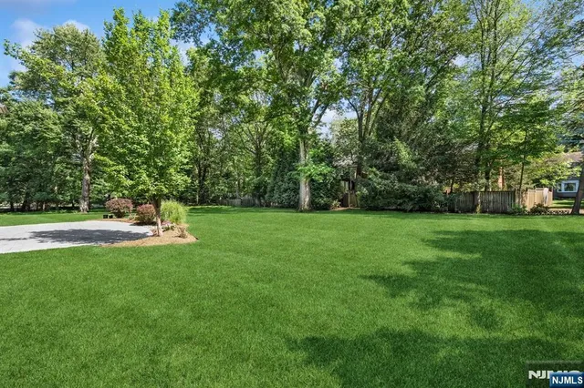 a view of a house with a big yard
