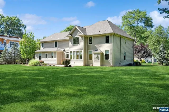 a view of a house with a big yard