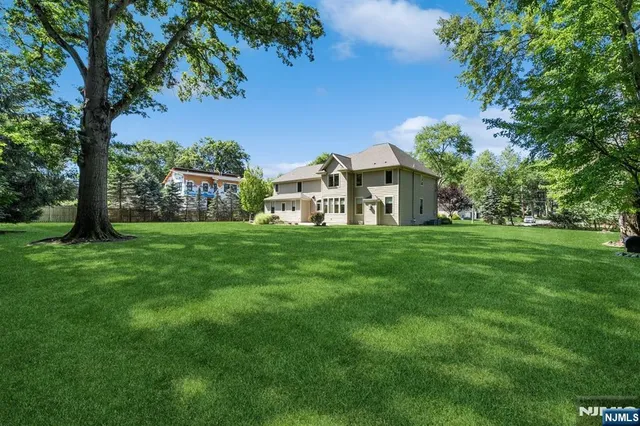 a front view of a house with yard