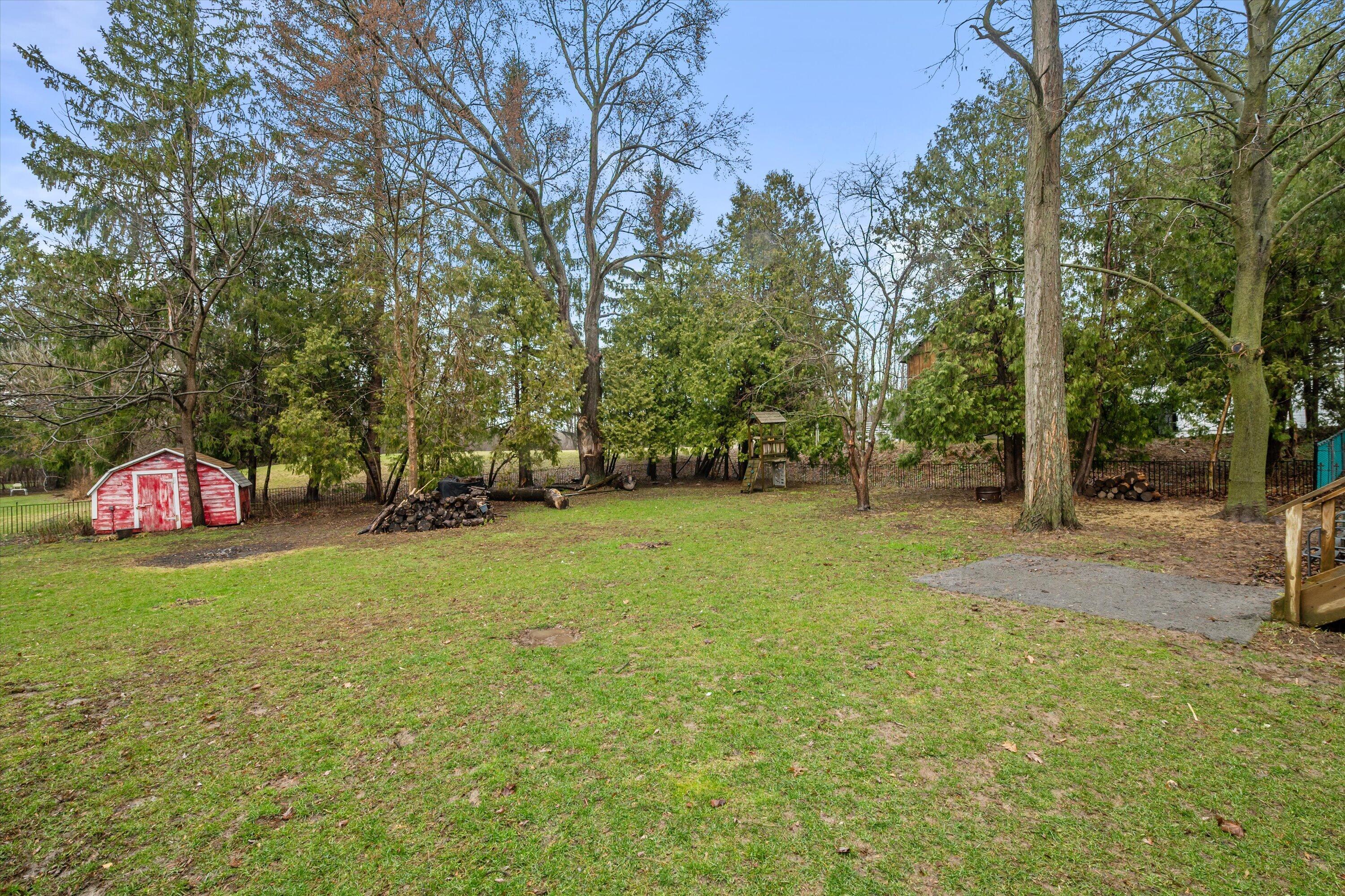 10806 West Freistadt Road Mequon, WI 53097 - Photo 26 of 33 Spacious backyard