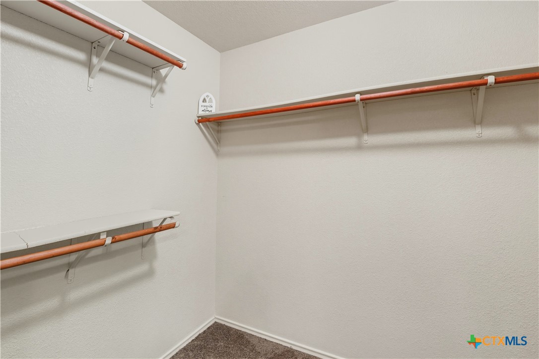 2411 Settlement Road Copperas Cove, TX 76522 - Photo 19 of 38 a view of a room with racks on the wall