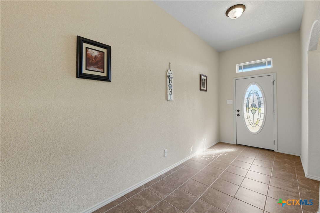 2411 Settlement Road Copperas Cove, TX 76522 - Photo 2 of 38 a view of a livingroom with wooden floor