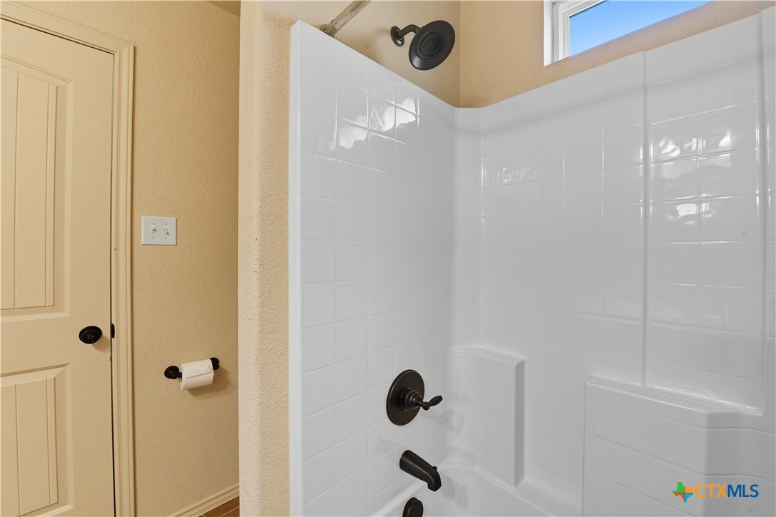 2411 Settlement Road Copperas Cove, TX 76522 - Photo 23 of 38 a bathroom with a shower