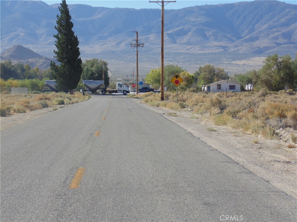 10650 Kendall Road Lucerne Valley, CA 92356 - Photo 1 of 6 a view of a road with a road bridge