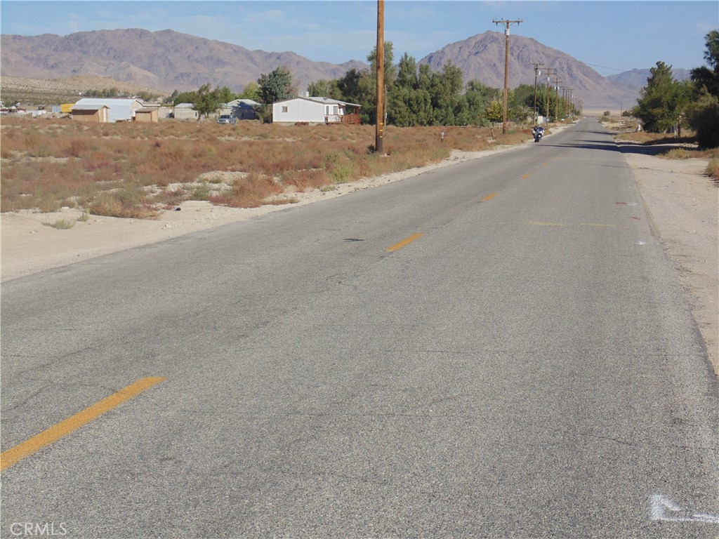10650 Kendall Road Lucerne Valley, CA 92356 - Photo 2 of 6 a view of a street with a road