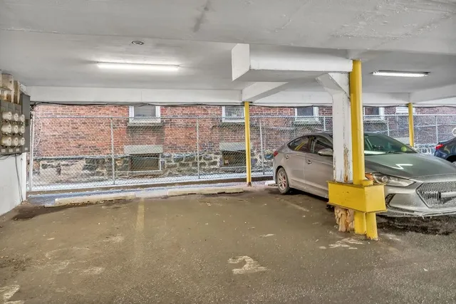 a car parked in front of a building