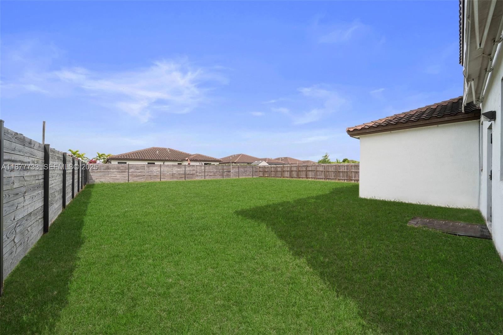 12833 Southwest 229th Terrace Miami, FL 33170 - Photo 15 of 43 a view of outdoor space and yard