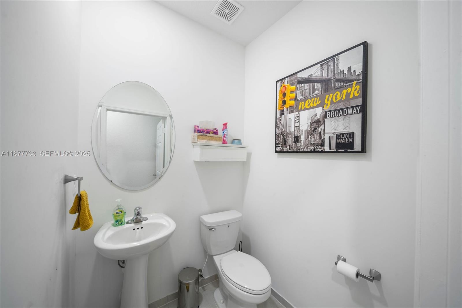 12833 Southwest 229th Terrace Miami, FL 33170 - Photo 20 of 43 a bathroom with a toilet sink and mirror