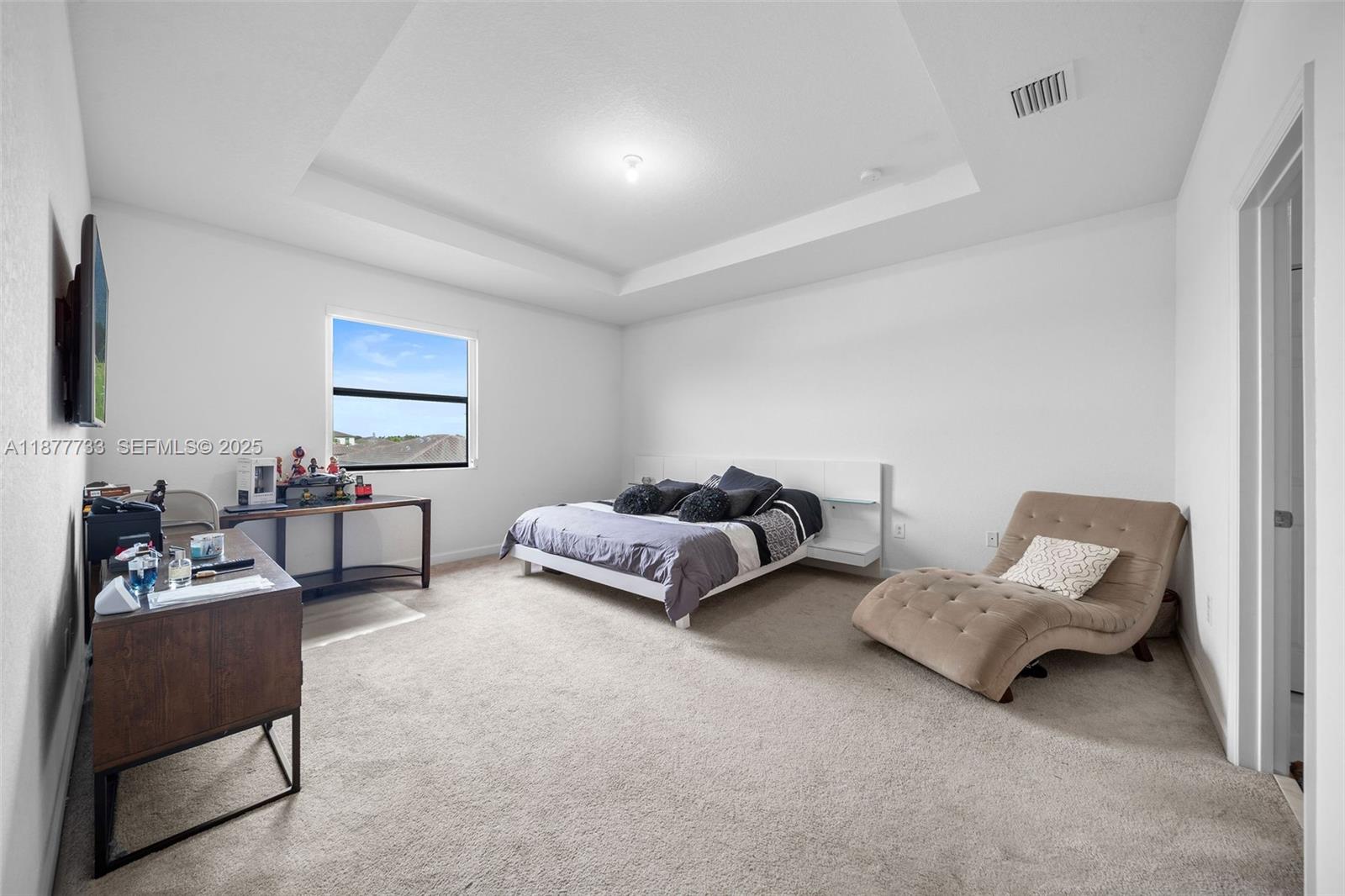 12833 Southwest 229th Terrace Miami, FL 33170 - Photo 22 of 43 a bedroom with furniture and a chair