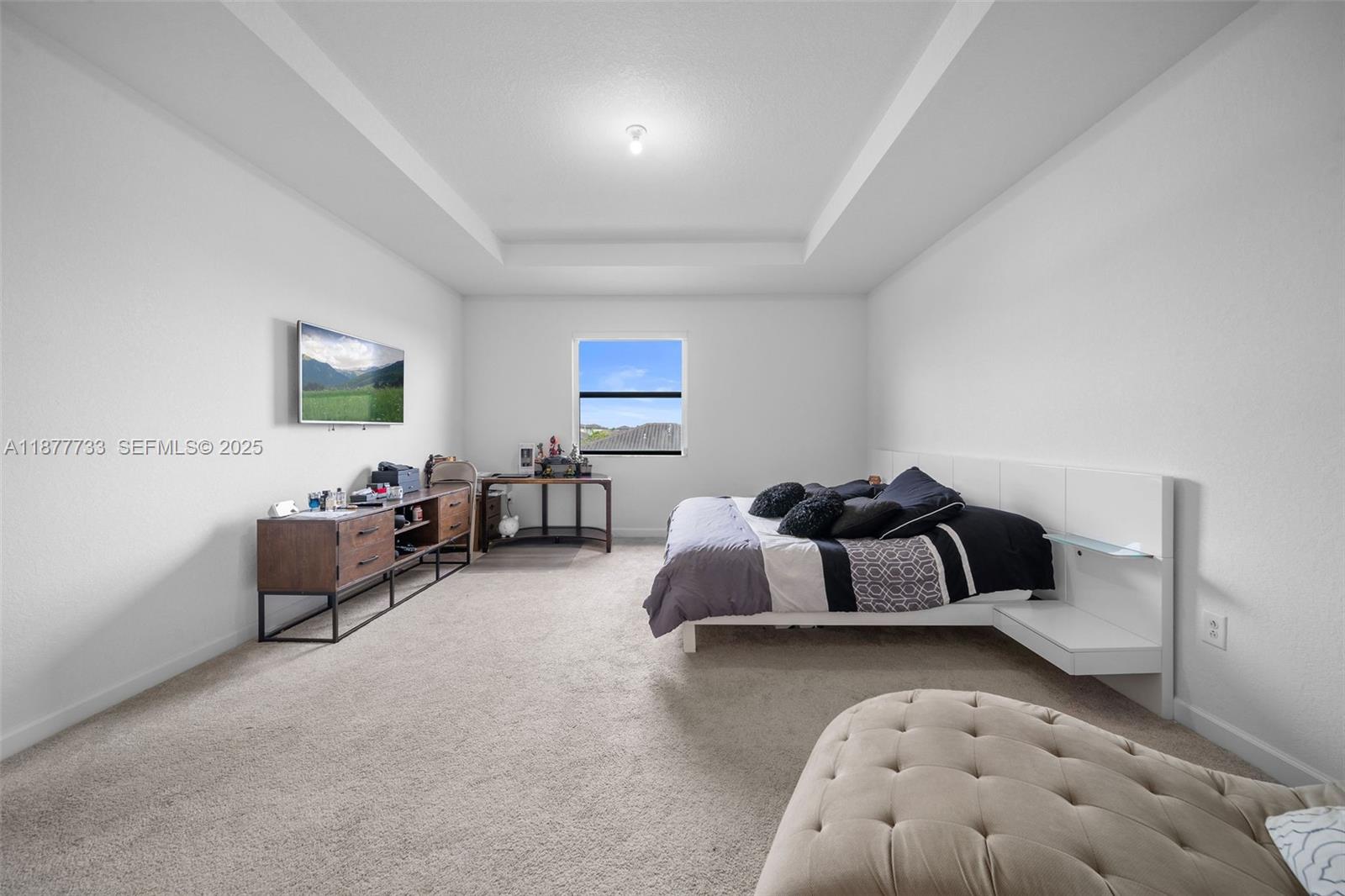 12833 Southwest 229th Terrace Miami, FL 33170 - Photo 23 of 43 a bedroom with bed and a couch