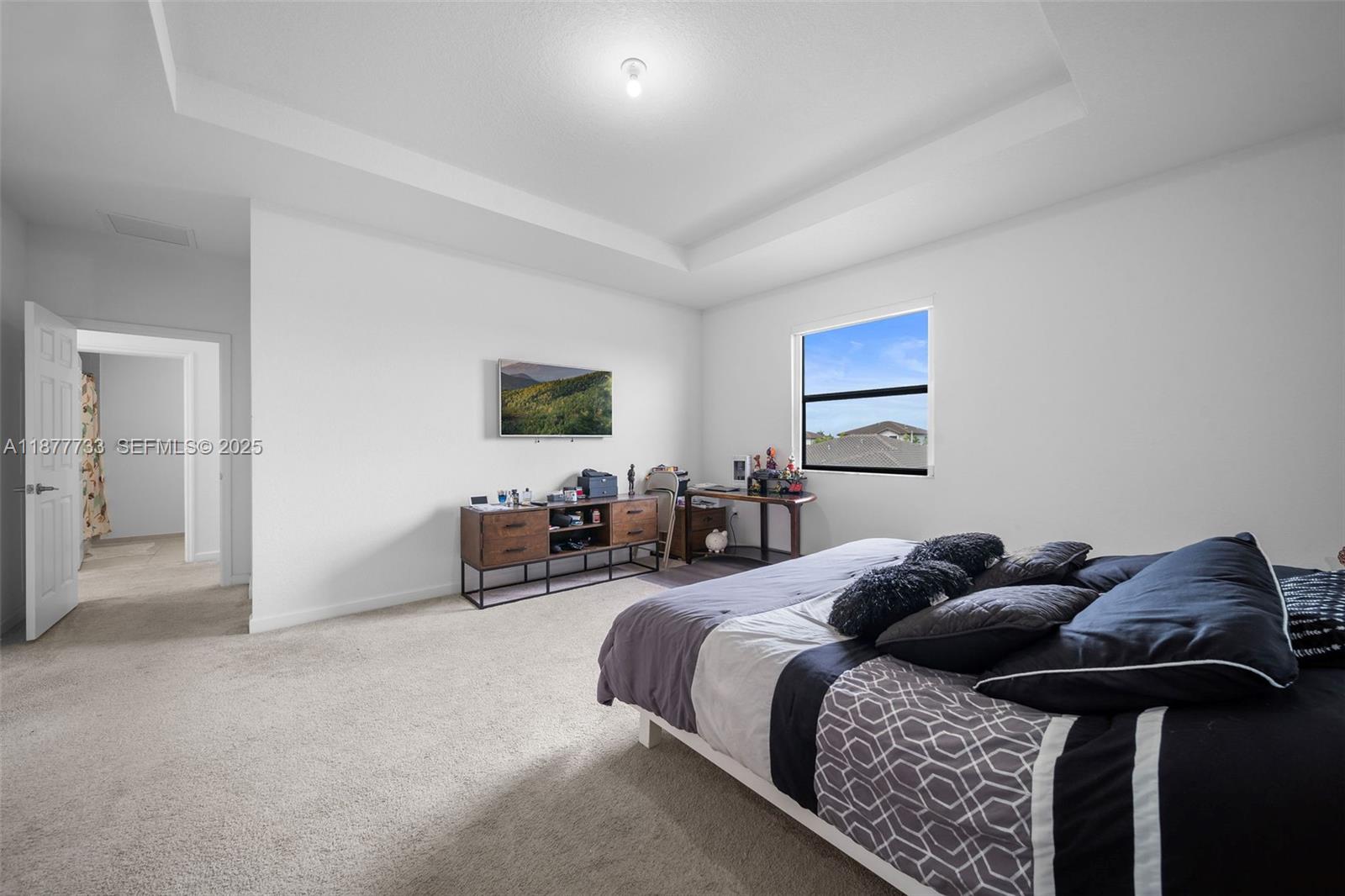 12833 Southwest 229th Terrace Miami, FL 33170 - Photo 24 of 43 a bed room with furniture and a lamp