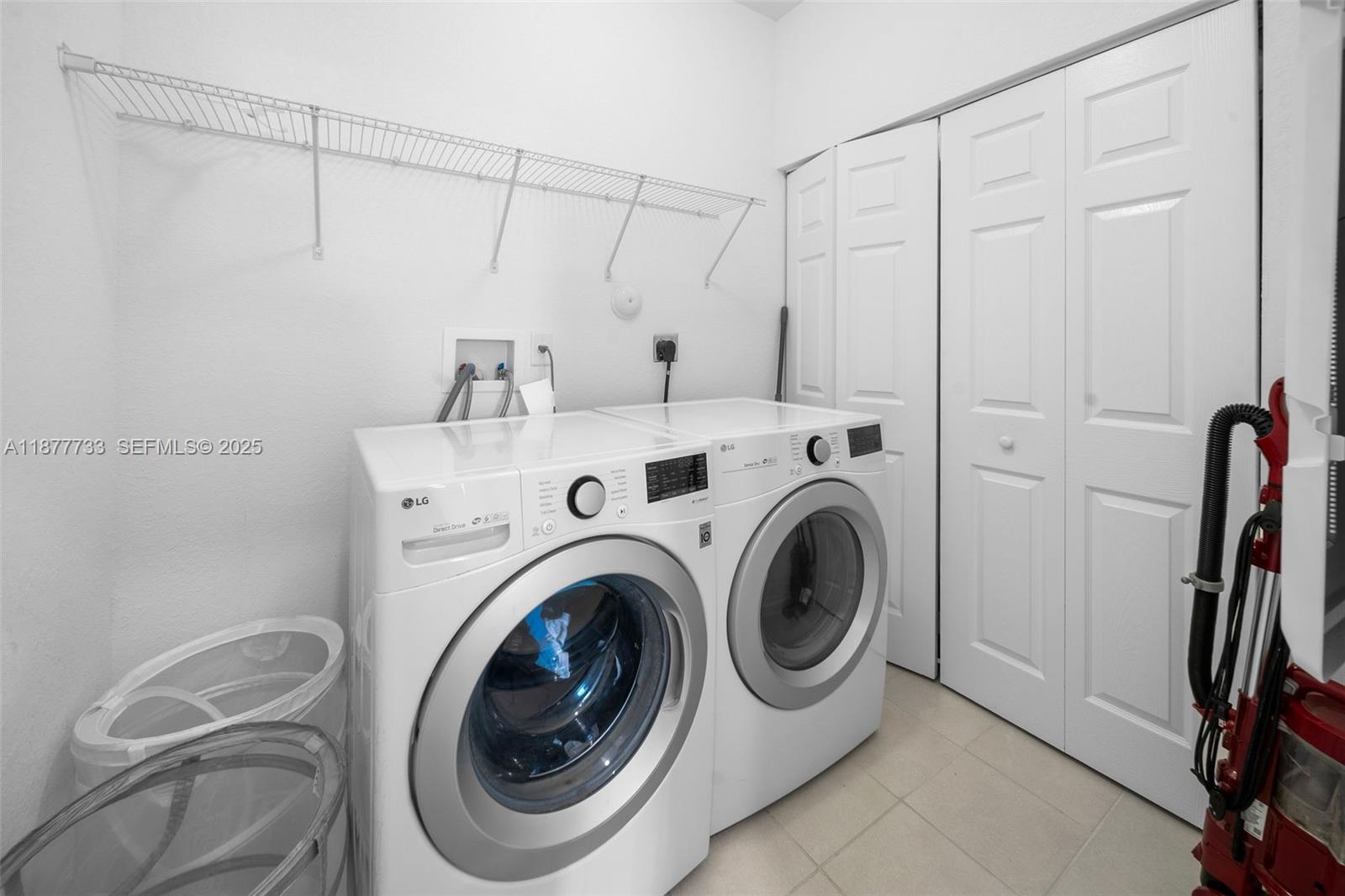 12833 Southwest 229th Terrace Miami, FL 33170 - Photo 31 of 43 a utility room with dryer and washer